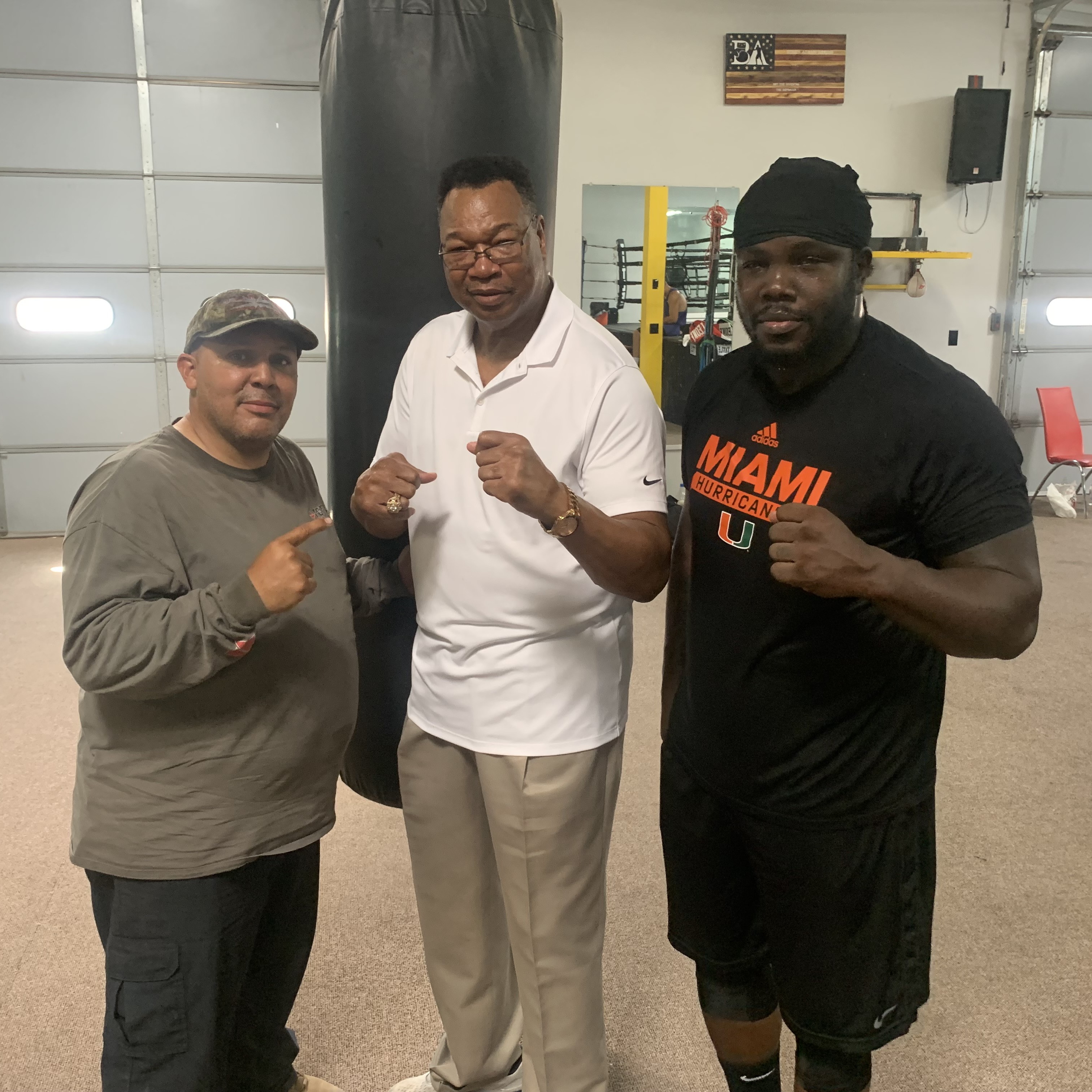 Coach Angel, Larry Holmes, and Bermane Stiverne